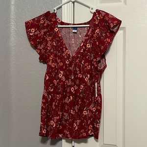 Flower print v neck shirt.